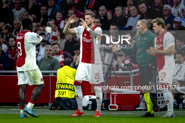 AFC Ajax Amsterdam forward Wout Weghorst replaces AFC Ajax Amsterdam forward Brian Brobbey during the match between Ajax and Besiktas at the...