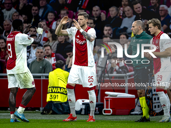 AFC Ajax Amsterdam forward Wout Weghorst replaces AFC Ajax Amsterdam forward Brian Brobbey during the match between Ajax and Besiktas at the...