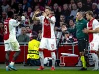 AFC Ajax Amsterdam forward Wout Weghorst replaces AFC Ajax Amsterdam forward Brian Brobbey during the match between Ajax and Besiktas at the...