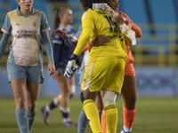 Khiara Keating #35 (GK) of Manchester City W.F.C. and Chiamaka Nnadozie #16 (GK) of Paris FC shake hands at full time during the UEFA Women'...