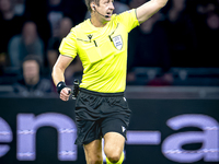 Referee John Brooks officiates the match between Ajax and Besiktas at the Johan Cruijff ArenA for the UEFA Europa League - League phase - Ma...