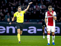 Referee John Brooks officiates the match between Ajax and Besiktas at the Johan Cruijff ArenA for the UEFA Europa League - League phase - Ma...