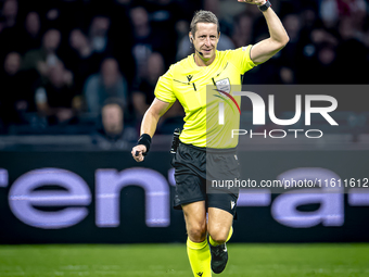 Referee John Brooks officiates the match between Ajax and Besiktas at the Johan Cruijff ArenA for the UEFA Europa League - League phase - Ma...