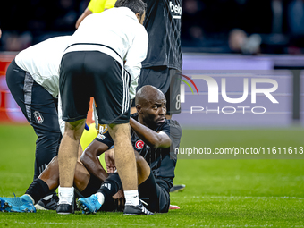 Besiktas JK midfielder Al Musrati gets injured during the match between Ajax and Besiktas at the Johan Cruijff ArenA for the UEFA Europa Lea...