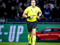 Referee John Brooks officiates the match between Ajax and Besiktas at the Johan Cruijff ArenA for the UEFA Europa League - League phase - Ma...