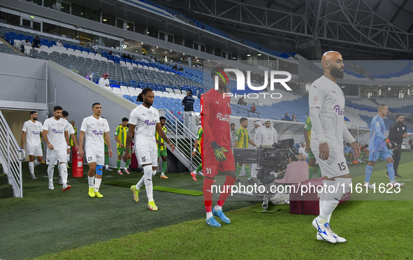 Al-Wakrah SC and Al-Khor SC players walk onto the pitch before the Ooredoo Qatar Stars League 24/25 match between Al-Wakrah SC and Al-Khor S...