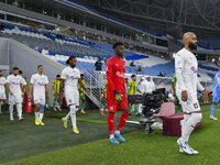 Al-Wakrah SC and Al-Khor SC players walk onto the pitch before the Ooredoo Qatar Stars League 24/25 match between Al-Wakrah SC and Al-Khor S...