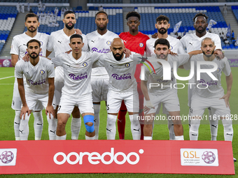 Al-Khor SC players pose for a team photo prior to the Ooredoo Qatar Stars League 24/25 match between Al-Wakrah SC and Al-Khor SC at Al Janou...