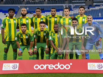 Al-Wakrah SC players pose for a team photo prior to the Ooredoo Qatar Stars League 24/25 match between Al-Wakrah SC and Al-Khor SC at Al Jan...