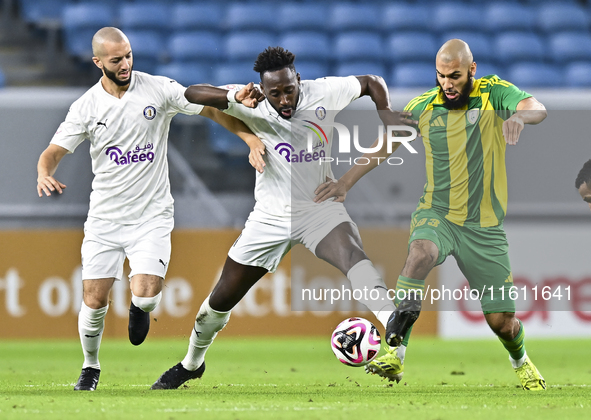 Aissa Belal Laidouni of Al Wakrah SC battles for the ball with Yohan Boli of Al-Khor SC during the Ooredoo Qatar Stars League 24/25 match be...