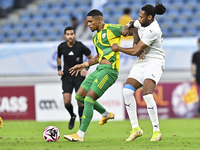 Ricardo Jorge Gomes (L) of Al Wakrah SC battles for the ball with Ruben Afonso Semedo (R) of Al-Khor SC during the Ooredoo Qatar Stars Leagu...