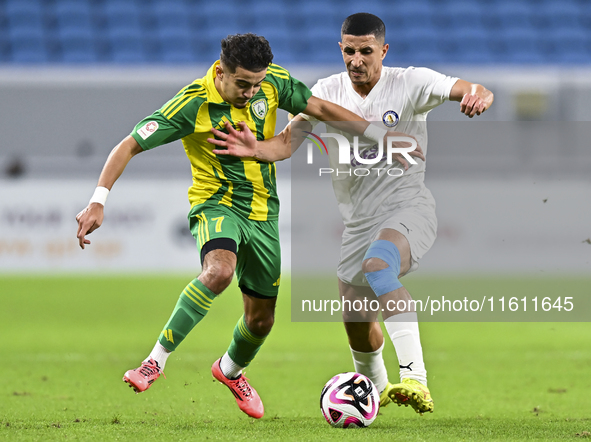 Ayoub Assal (L) of Al Wakrah SC battles for the ball with Gaser Yahia Madani (R) of Al-Khor SC during the Ooredoo Qatar Stars League 24/25 m...