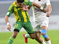 Ayoub Assal (L) of Al Wakrah SC battles for the ball with Gaser Yahia Madani (R) of Al-Khor SC during the Ooredoo Qatar Stars League 24/25 m...