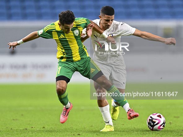 Ayoub Assal (L) of Al Wakrah SC battles for the ball with Gaser Yahia Madani (R) of Al-Khor SC during the Ooredoo Qatar Stars League 24/25 m...