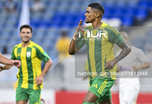 Ricardo Jorge Gomes (R) of Al Wakrah SC celebrates after scoring a goal during the Ooredoo Qatar Stars League 24/25 match between Al-Wakrah...