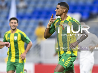 Ricardo Jorge Gomes (R) of Al Wakrah SC celebrates after scoring a goal during the Ooredoo Qatar Stars League 24/25 match between Al-Wakrah...