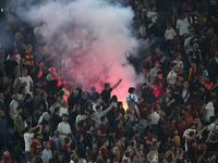 Athletic fans throw flares at Roma fans during the UEFA Europa League 2024/25 League Phase MD1 match between AS Roma and Athletic Club at St...