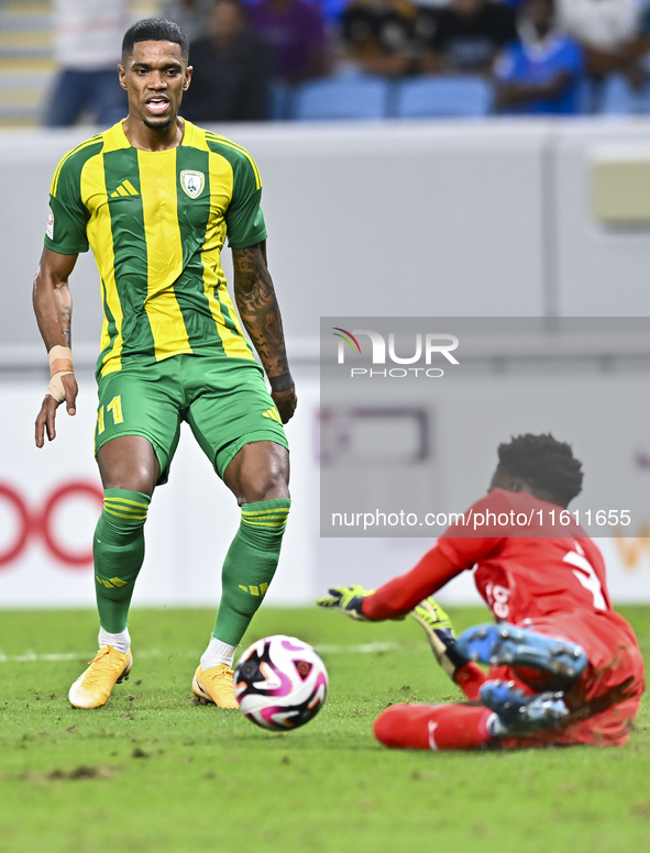 Ricardo Jorge Gomes (L) of Al Wakrah SC battles for the ball with Ahmed Basher Ali (R) of Al-Khor SC during the Ooredoo Qatar Stars League 2...