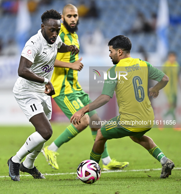 Omar Salah Alosad (#6) of Al Wakrah SC battles for the ball with Yohan Boli (L) of Al-Khor SC during the Ooredoo Qatar Stars League 24/25 ma...