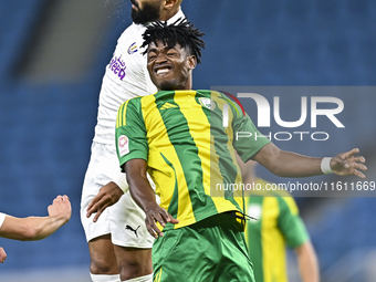 Jacinto Dala (R) of Al Wakrah SC battles for the ball with Naif Mubarak Al-Buriki (L) of Al-Khor SC during the Ooredoo Qatar Stars League 24...