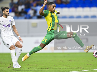 Ricardo Jorge Gomes (R) of Al Wakrah SC battles for the ball with Khaled Radwan Hassan (L) of Al-Khor SC during the Ooredoo Qatar Stars Leag...