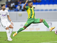 Ricardo Jorge Gomes (R) of Al Wakrah SC battles for the ball with Khaled Radwan Hassan (L) of Al-Khor SC during the Ooredoo Qatar Stars Leag...