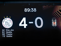 The scoreboard shows 4-0 during the match between Ajax and Besiktas at the Johan Cruijff ArenA for the UEFA Europa League - League phase - M...