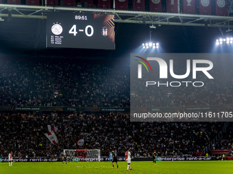 The scoreboard shows 4-0 during the match between Ajax and Besiktas at the Johan Cruijff ArenA for the UEFA Europa League - League phase - M...