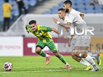 Ayoub Assal (L) of Al Wakrah SC battles for the ball with Gaser Yahia Madani (R) of Al-Khor SC during the Ooredoo Qatar Stars League 24/25 m...