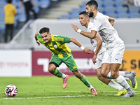 Ayoub Assal (L) of Al Wakrah SC battles for the ball with Gaser Yahia Madani (R) of Al-Khor SC during the Ooredoo Qatar Stars League 24/25 m...