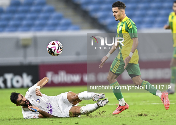 Ayoub Assal (right) of Al Wakrah SC battles for the ball with Adil Rhaili (bottom) of Al-Khor SC during the Ooredoo Qatar Stars League 24/25...