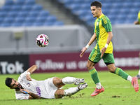 Ayoub Assal (right) of Al Wakrah SC battles for the ball with Adil Rhaili (bottom) of Al-Khor SC during the Ooredoo Qatar Stars League 24/25...