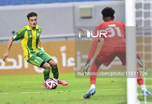 Ayoub Assal (#7) of Al Wakrah SC battles for the ball with Ahmed Basher Ali (R) of Al-Khor SC during the Ooredoo Qatar Stars League 24/25 ma...