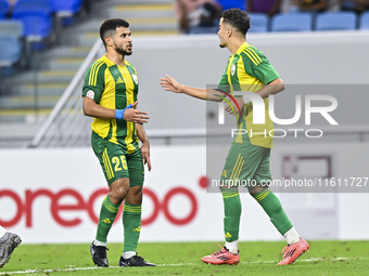 Ayoub Assal (R) of Al Wakrah SC celebrates after scoring a goal during the Ooredoo Qatar Stars League 24/25 match between Al-Wakrah SC and A...