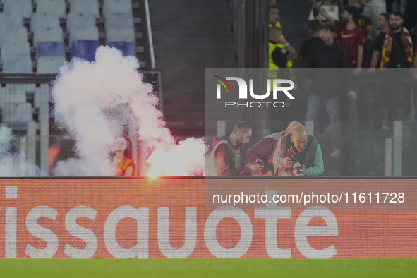 Athletic fans throw flares at photographers during the UEFA Europa League 2024/25 League Phase MD1 match between AS Roma and Athletic Club a...