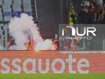 Athletic fans throw flares at photographers during the UEFA Europa League 2024/25 League Phase MD1 match between AS Roma and Athletic Club a...