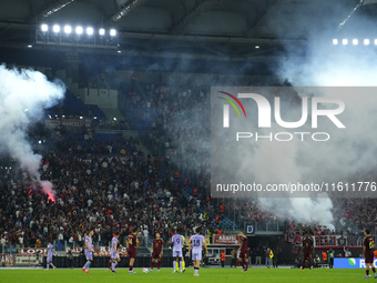 Athletic fans throw flares at Roma fans during the UEFA Europa League 2024/25 League Phase MD1 match between AS Roma and Athletic Club at St...