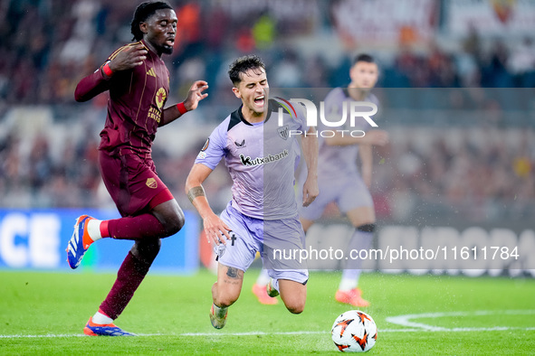 Manu Kone' of AS Roma and Benat Prados of Athletic Club compete for the ball during the UEFA Europa League 2024/25 League Phase MD1 match be...