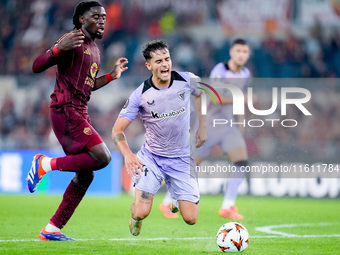 Manu Kone' of AS Roma and Benat Prados of Athletic Club compete for the ball during the UEFA Europa League 2024/25 League Phase MD1 match be...