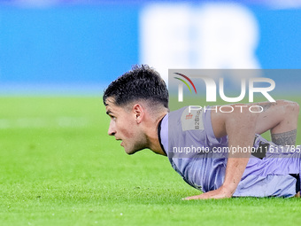 Benat Prados of Athletic Club lies on the pitch during the UEFA Europa League 2024/25 League Phase MD1 match between AS Roma and Athletic Cl...