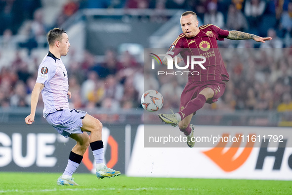 Angelino of AS Roma and Benat Prados of Athletic Club compete for the ball during the UEFA Europa League 2024/25 League Phase MD1 match betw...