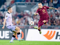 Angelino of AS Roma and Benat Prados of Athletic Club compete for the ball during the UEFA Europa League 2024/25 League Phase MD1 match betw...