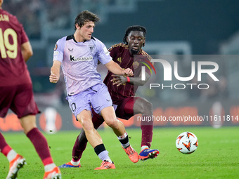 Unai Gomez of Athletic Club and Manu Kone' of AS Roma compete for the ball during the UEFA Europa League 2024/25 League Phase MD1 match betw...