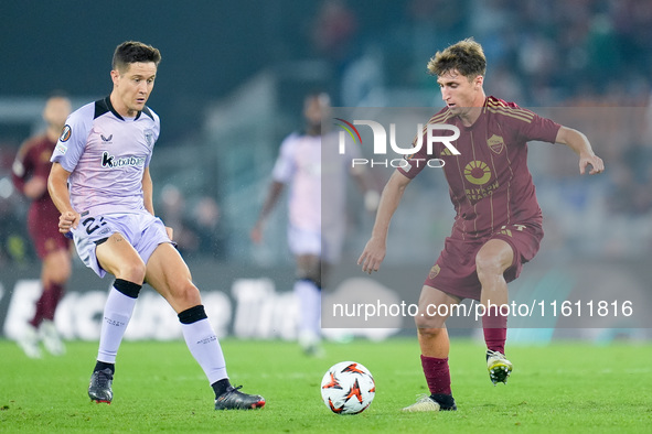 Ander Herrera of Athletic Club and Tommaso Baldanzi of AS Roma compete for the ball during the UEFA Europa League 2024/25 League Phase MD1 m...