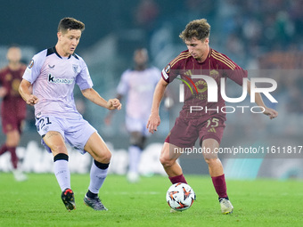 Ander Herrera of Athletic Club and Tommaso Baldanzi of AS Roma compete for the ball during the UEFA Europa League 2024/25 League Phase MD1 m...