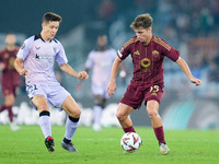 Ander Herrera of Athletic Club and Tommaso Baldanzi of AS Roma compete for the ball during the UEFA Europa League 2024/25 League Phase MD1 m...