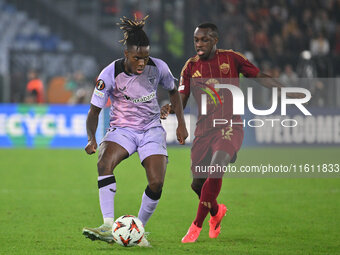 Nico Williams of Athletic Club de Bilbao and Saud Abdulhamid of A.S. Roma are in action during the UEFA Europa League 2024/25 League Phase M...