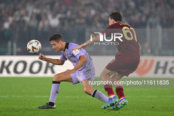 Ander Herrera of Athletic Club de Bilbao and Niccolo Pisilli of A.S. Roma are in action during the UEFA Europa League 2024/25 League Phase M...