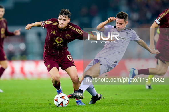 Ander Herrera of Athletic Club and Niccolo' Pisilli of AS Roma compete for the ball during the UEFA Europa League 2024/25 League Phase MD1 m...