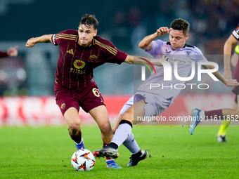 Ander Herrera of Athletic Club and Niccolo' Pisilli of AS Roma compete for the ball during the UEFA Europa League 2024/25 League Phase MD1 m...